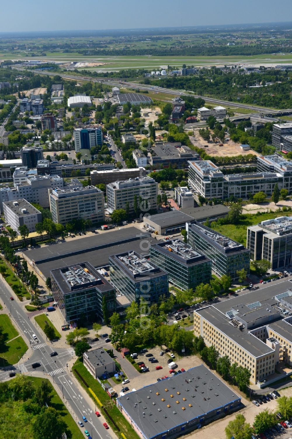 Aerial photograph Warschau Mokotow - Office and Commercial Building Park Postepu operated by IMMOFINANZ AG in Mokotov district of Warsaw in Poland