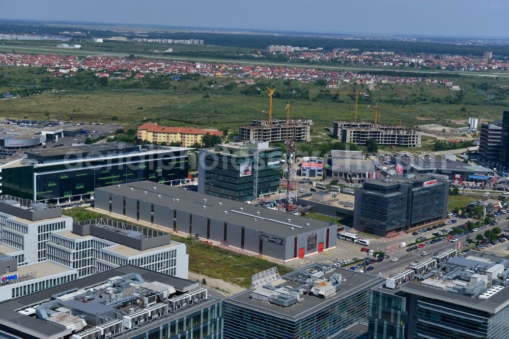 Aerial image Bukarest - View of the office and commercial building complex Pipera 1-2 in Bucharest, Romania. The property on the street Pipera-Tunari Blvd. is a project of IMMOFINANZ AG. The company vodafone is anchor tenant