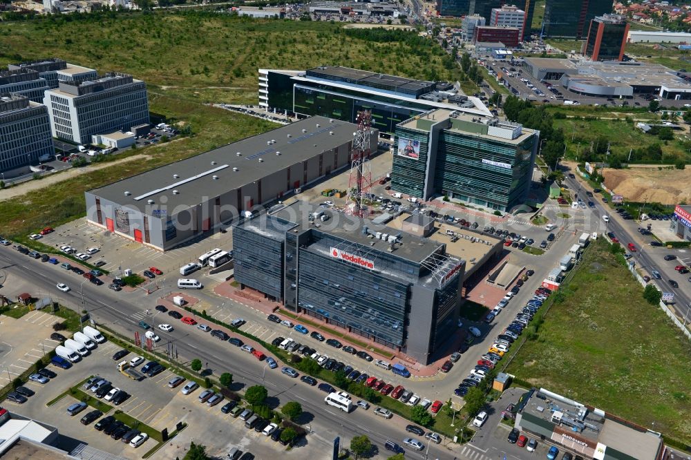 Aerial image Bukarest - View of the office and commercial building complex Pipera 1-2 in Bucharest, Romania. The property on the street Pipera-Tunari Blvd. is a project of IMMOFINANZ AG. The company vodafone is anchor tenant