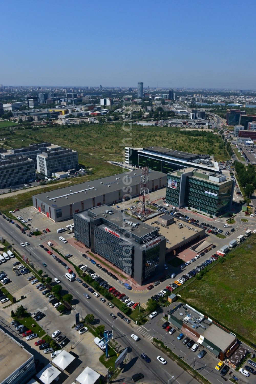 Aerial photograph Bukarest - View of the office and commercial building complex Pipera 1-2 in Bucharest, Romania. The property on the street Pipera-Tunari Blvd. is a project of IMMOFINANZ AG. The company vodafone is anchor tenant