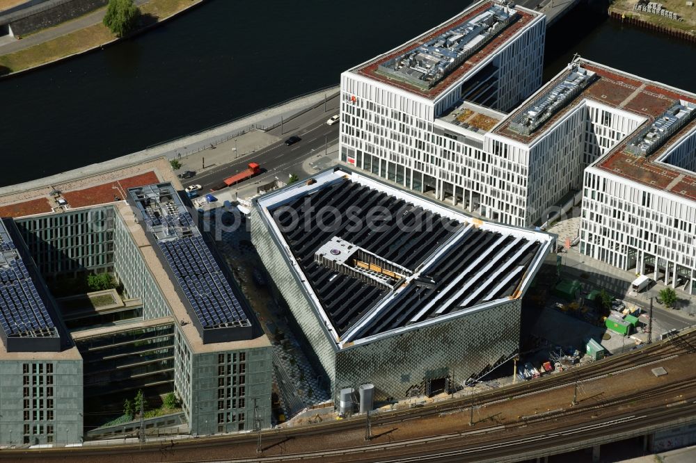 Aerial image Berlin - Office building - Ensemble of the PricewaterhouseCoopers GmbH WPG , the Futurium gGmbH and the Anti-Discrimination Agency of the Federation in Berlin, Germany. The design for the PwC office building came from the architecture office KSP - Juergen Engel Architekten and was implemented by the project developer OVG Bischoff, while the museum building of Futurium gGmbH was designed by the Richter Musikowski GmbH