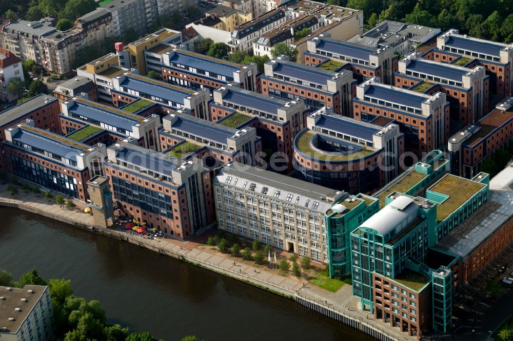 Aerial photograph Berlin - Office and Geschaeftshaus- Ensemble am Spreebogen in Berlin. Here is among others the IPU Berlin, International Psychoanalytic University Berlin and the AMERON Hotel ABION Spreebogen