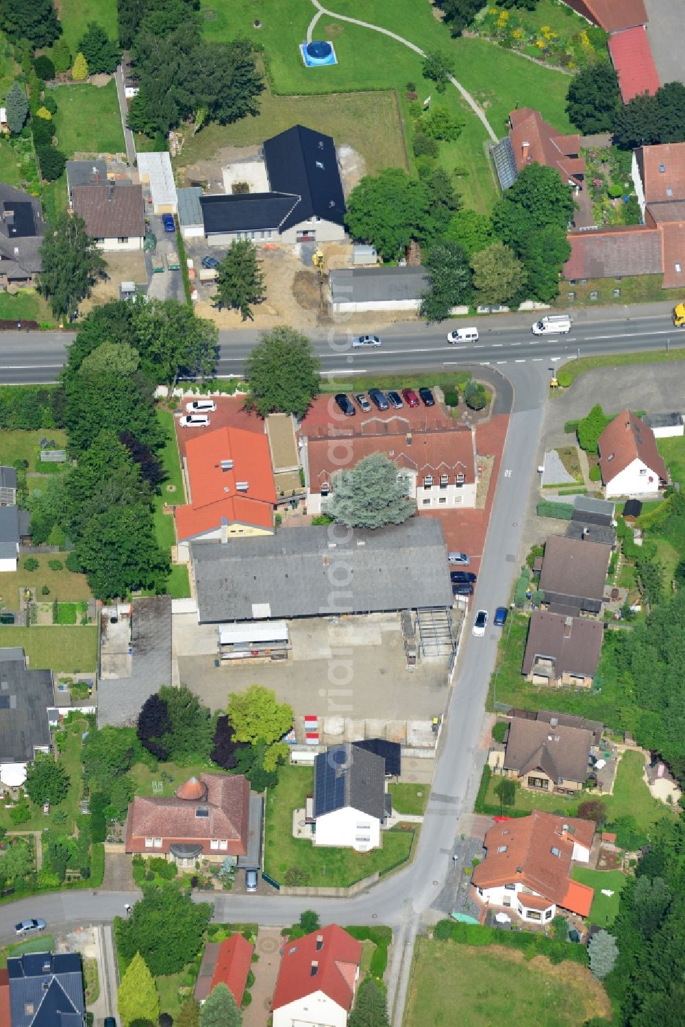 Aerial photograph Unna - Office and retail building at the Vaerstbrücke in Unna in North Rhine-Westphalia. The building is the headquarters of the group Markus Gerold