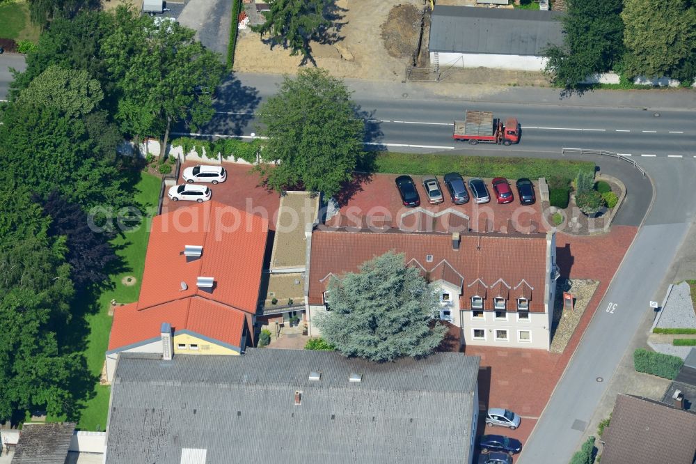 Unna from the bird's eye view: Office and retail building at the Vaerstbrücke in Unna in North Rhine-Westphalia. The building is the headquarters of the group Markus Gerold