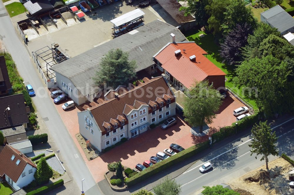 Unna from the bird's eye view: Office and retail building at the Vaerstbrücke in Unna in North Rhine-Westphalia. The building is the headquarters of the group Markus Gerold