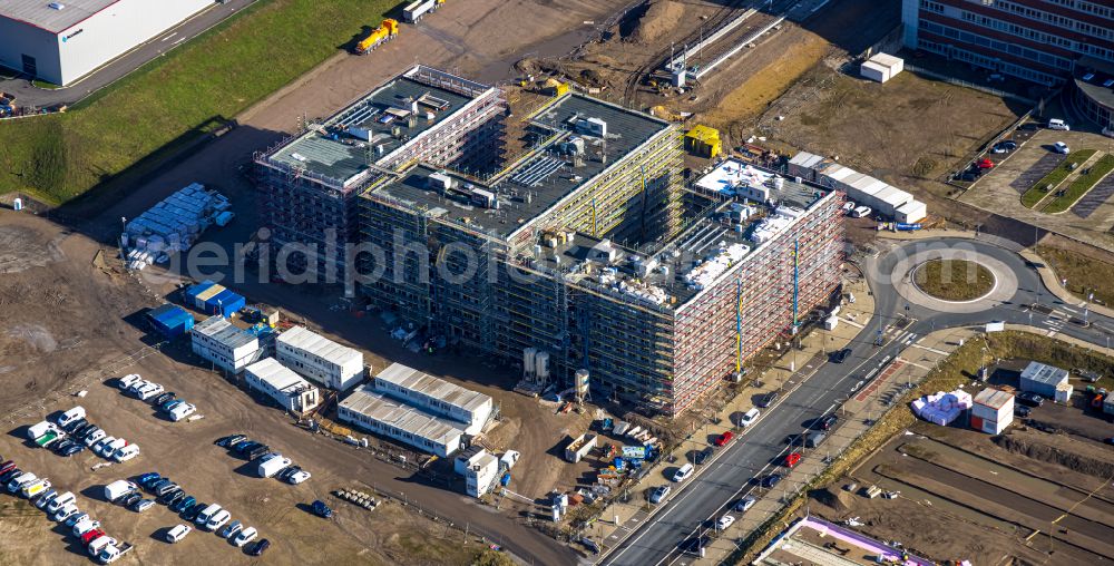 Bochum from above - Office and commercial building O-Werk and construction of the new road on Opelring in the development area MARK 51A?7 in Bochum at Ruhrgebiet in the state North Rhine-Westphalia, Germany