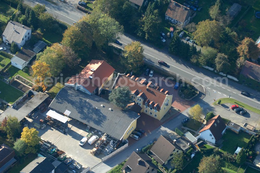 Unna from above - Büro- und Geschäftshaus, zugleich Firmenhauptsitz der Unternehmensgruppe Markus Gerold an der Vaerstbrücke 1 in 59425 Unna.