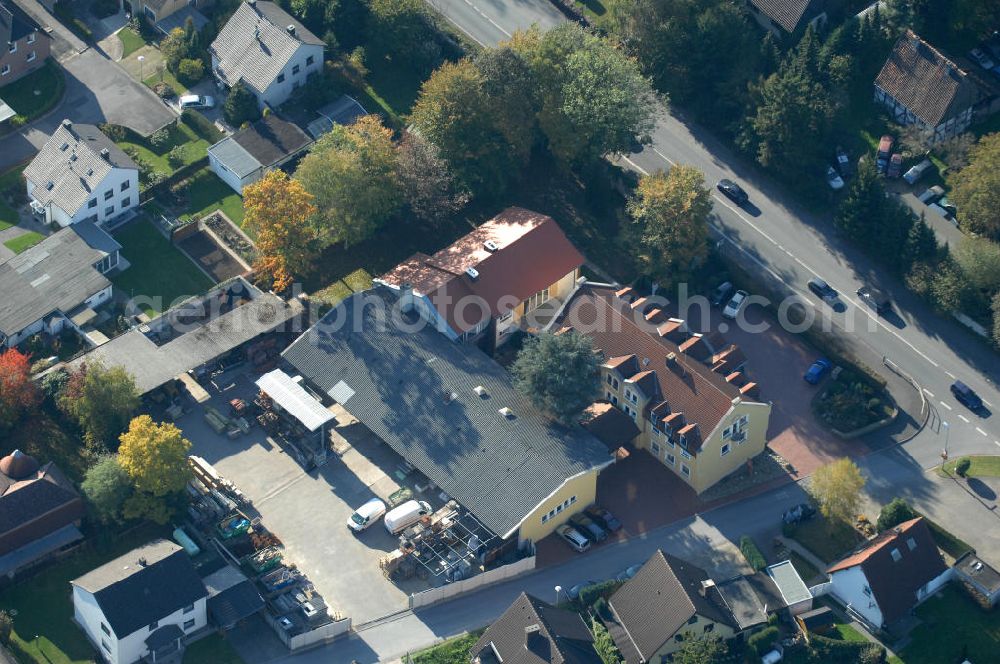 Unna from the bird's eye view: Büro- und Geschäftshaus, zugleich Firmenhauptsitz der Unternehmensgruppe Markus Gerold an der Vaerstbrücke 1 in 59425 Unna.