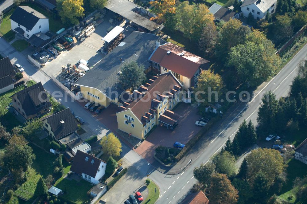 Unna from the bird's eye view: Büro- und Geschäftshaus, zugleich Firmenhauptsitz der Unternehmensgruppe Markus Gerold an der Vaerstbrücke 1 in 59425 Unna.