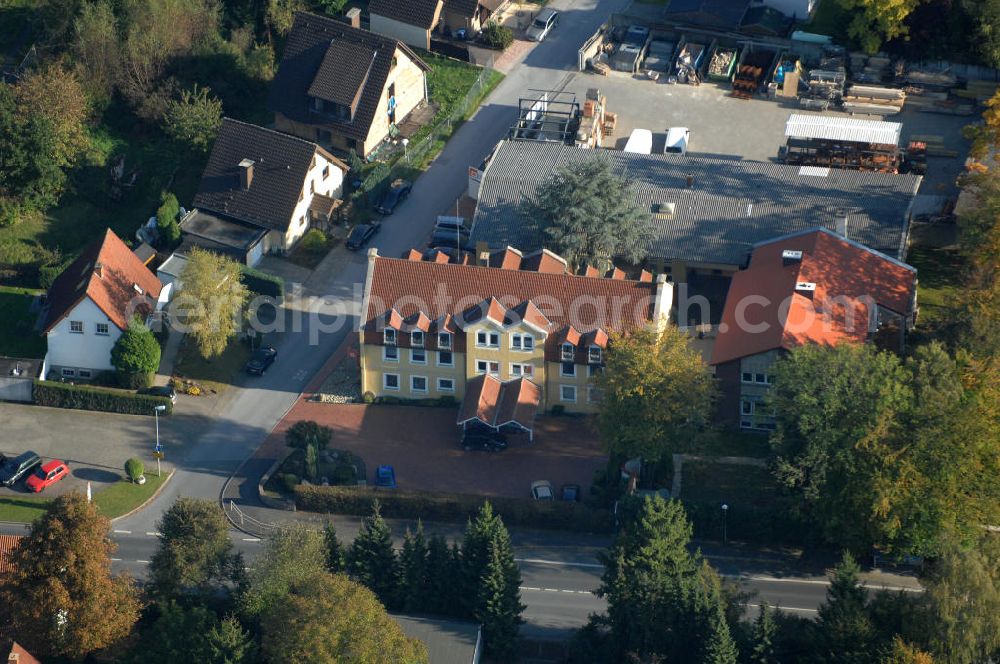 Aerial photograph Unna - Büro- und Geschäftshaus, zugleich Firmenhauptsitz der Unternehmensgruppe Markus Gerold an der Vaerstbrücke 1 in 59425 Unna.