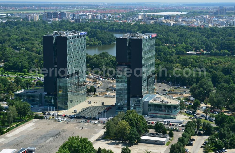 Bukarest from the bird's eye view: Office and retail building construction of the twin towers of Rompetrol in Bucharest in Romania. The high-rise building City gate also houses the telecommunications company Romtelecom, the Millennium Development Bank and the regional headquarters of Microsoft