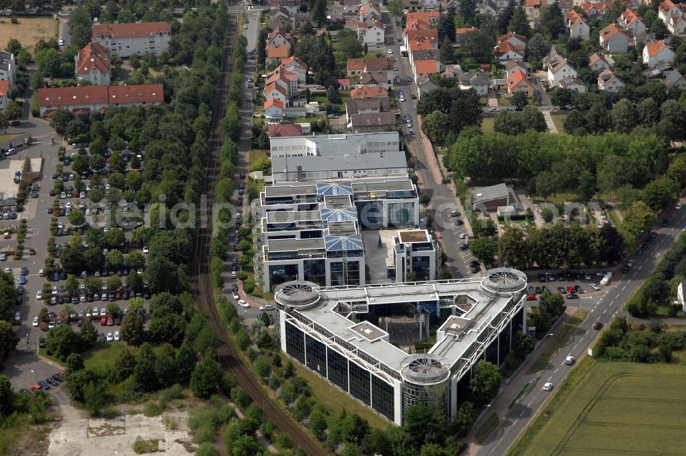 Bad Homburg von der Höhe from above - Blick auf das Bürogebäude Porticus und die Geschäftsstelle von Customer Care & Consulting GmbH im Stadtteil Ober-Eschbach von Bad Homburg in Hessen. Das Bürogebäude Porticus bietet vielen Unternehmen, wie z.B. dem Bildungswerk der Hessischen Wirtschaft e.V und der ILOG Deutschland GmbH Büroflächen. Kontakt: ILOG Deutschland GmbH, Tel. +49 (0) 617 240 600,