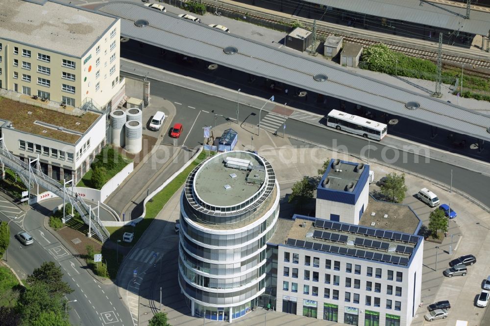 Aerial photograph Unna - Office building on Bahnhofstrasse in the North of Unna in the state of North Rhine-Westphalia. The distinct building with ovale shape and glass facade includes the job center of the county district of Unna