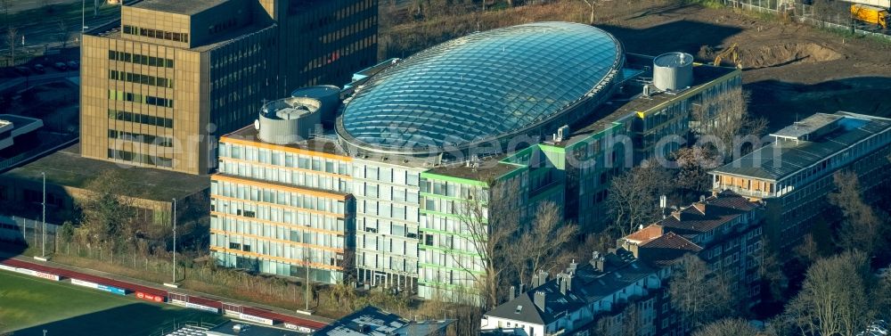 Düsseldorf from above - Office building of Deloitte Germany in Duesseldorf in the state of North Rhine-Westphalia. The building with the colourful facade and the glass roof is located on the edge of the sports centre North