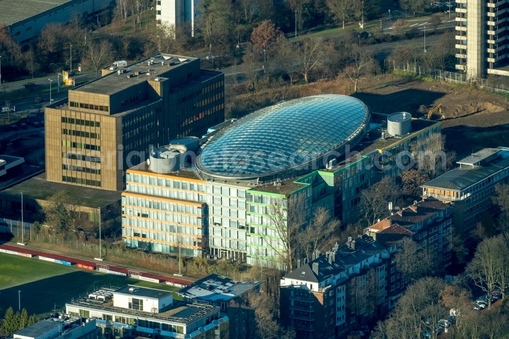 Düsseldorf from the bird's eye view: Office building of Deloitte Germany in Duesseldorf in the state of North Rhine-Westphalia. The building with the colourful facade and the glass roof is located on the edge of the sports centre North