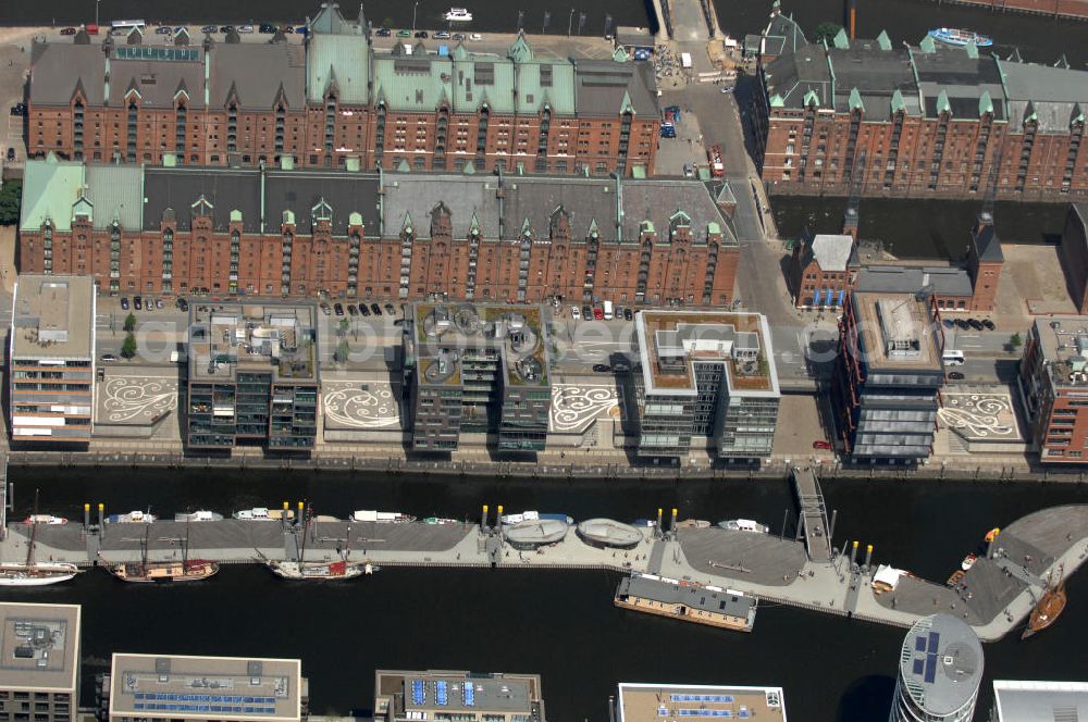 Hamburg from above - Office Building and condominiums at the street Am Sandtorkai in the Hafencity district Hamburg and in the warehouse district