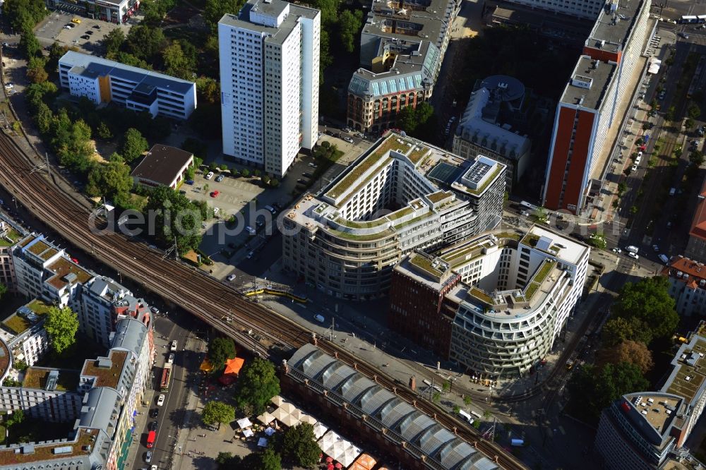 Aerial photograph Berlin Mitte - Office buildings with shops on the station Hackescher Markt in the district Mitte in Berlin