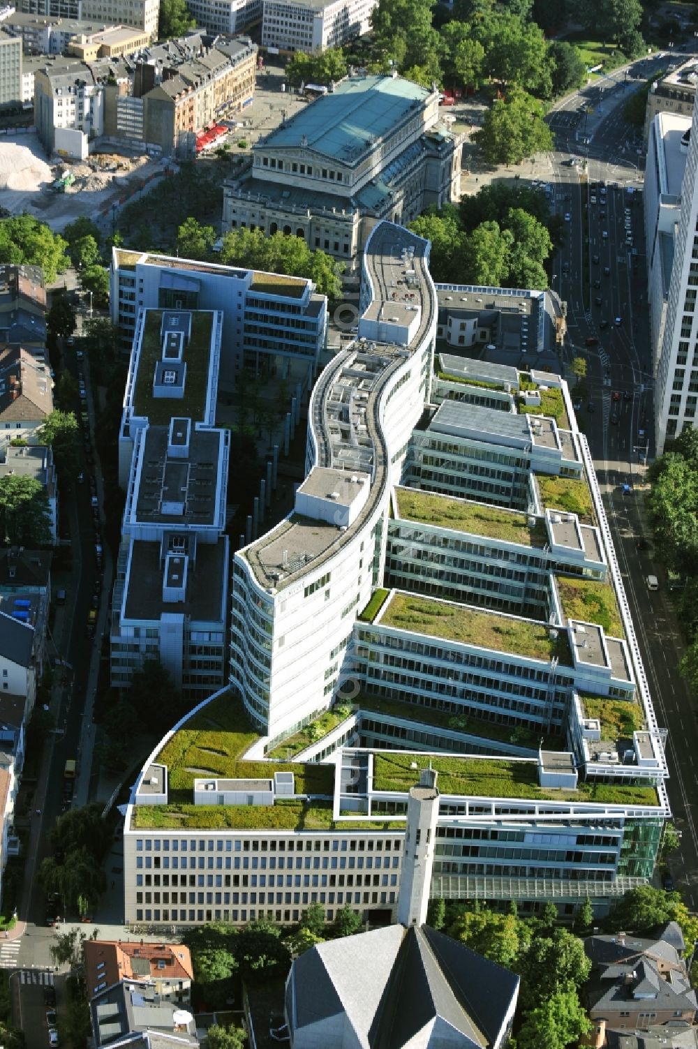 Aerial photograph Frankfurt am Main - The Frankfurter Welle is a biuling complex in the shape of a wave and was built between 1998 and 2003. It contains offices, restaurants, retail trade, and apartements