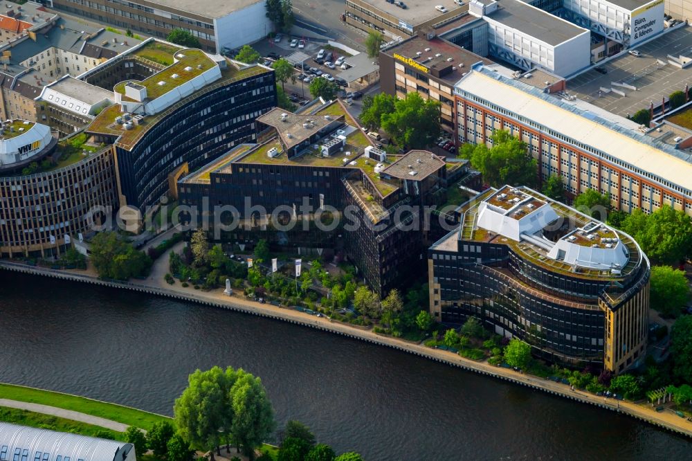 Aerial photograph Berlin - Office building of the administrative and business center of Skandia Insurance Management & Service GmbH at the riverside in Berlin