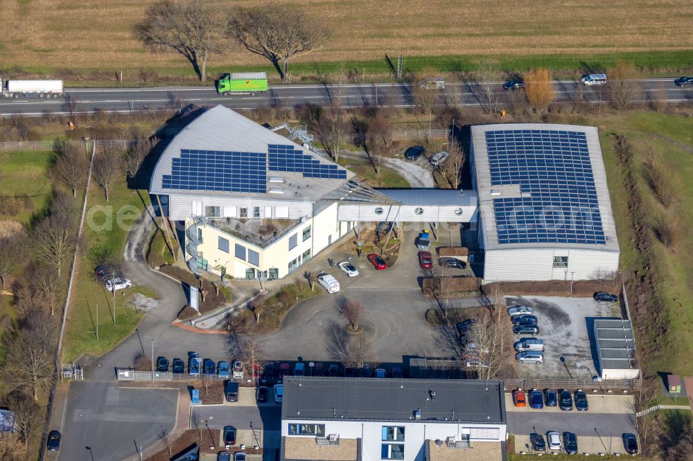 Aerial image Unna - Photovoltaic system on the roof of the office building of the administration and commercial building of PVS Westfalen -Sued rkV on Heinrich-Hertz-Strasse in the district of Uelzen in Unna in the Ruhr area in the state North Rhine-Westphalia, Germany