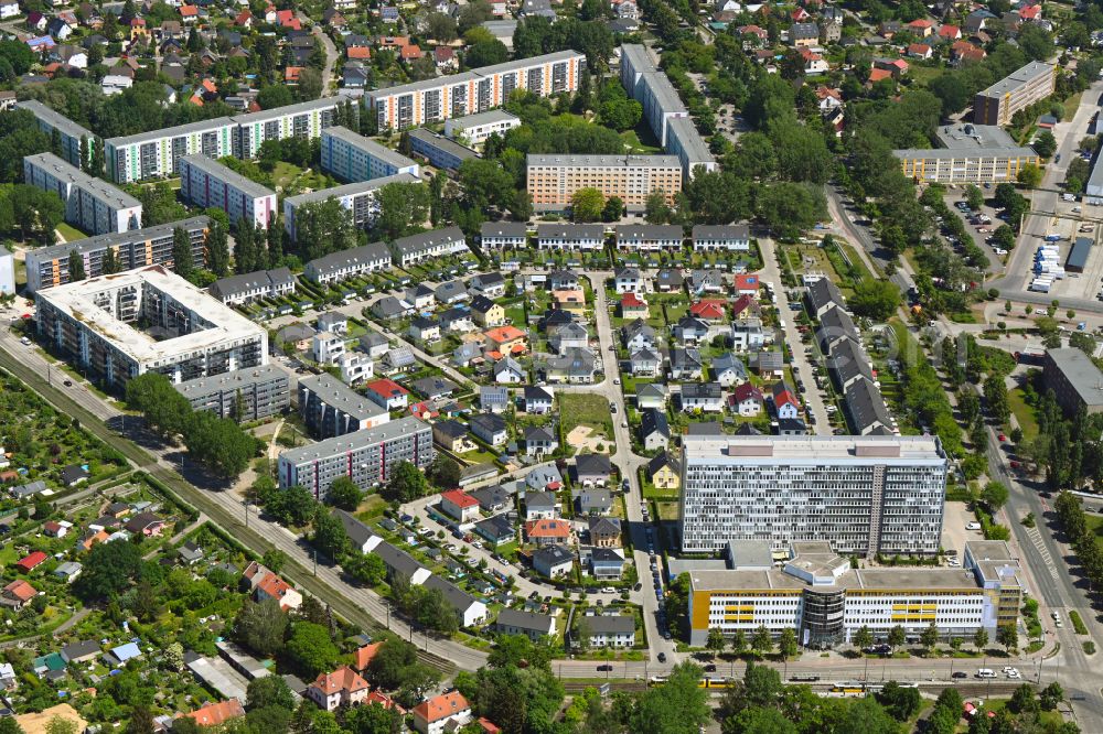 Aerial image Berlin - Office building of the administration and commercial building Q twenty-nine against the backdrop of a single-family house settlement on Gehrenseestrasse in the Hohenschoenhausen district of Berlin, Germany