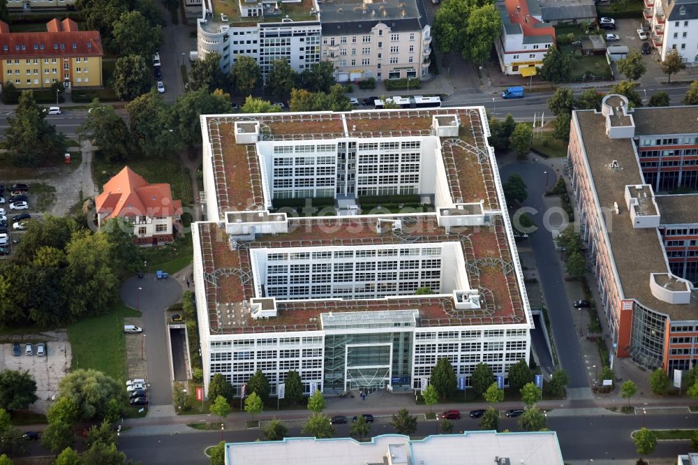 Aerial photograph Teltow - Office building in the commercial area of Techno Terrain Teltow on Potsdamer Strasse in Teltow in the state of Brandenburg. Olympus and Rewe are located in the modern building