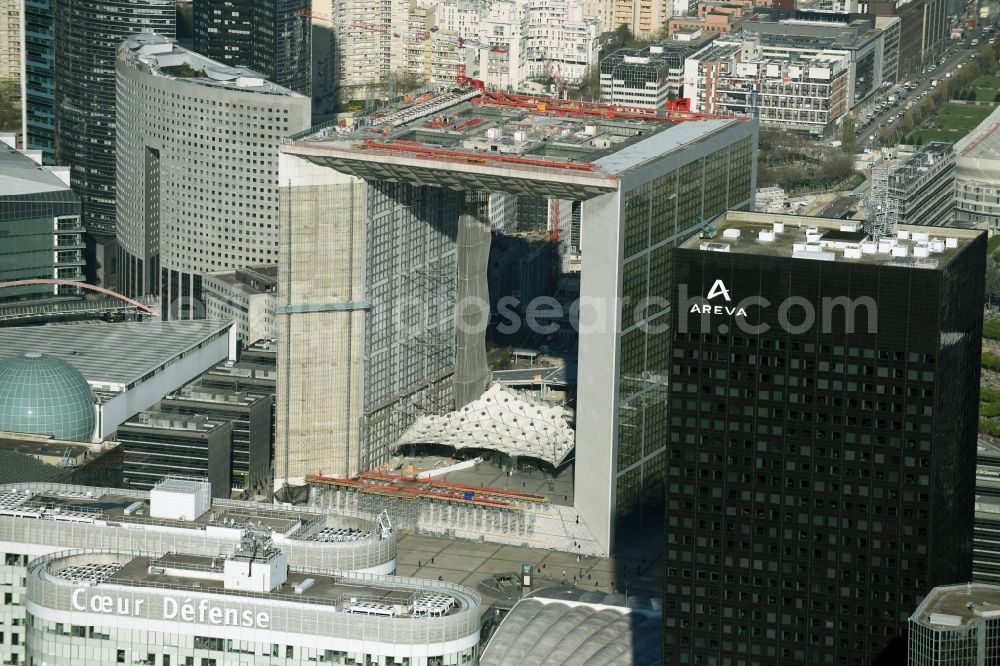 Paris from above - Office building Grande Arche and skyscraper Tour Areva in the business quarter of highrise buildings La Défense in Paris in Ile-de-France, France. It is home to the ministry of commerce and traffic, to offices and the human rights association