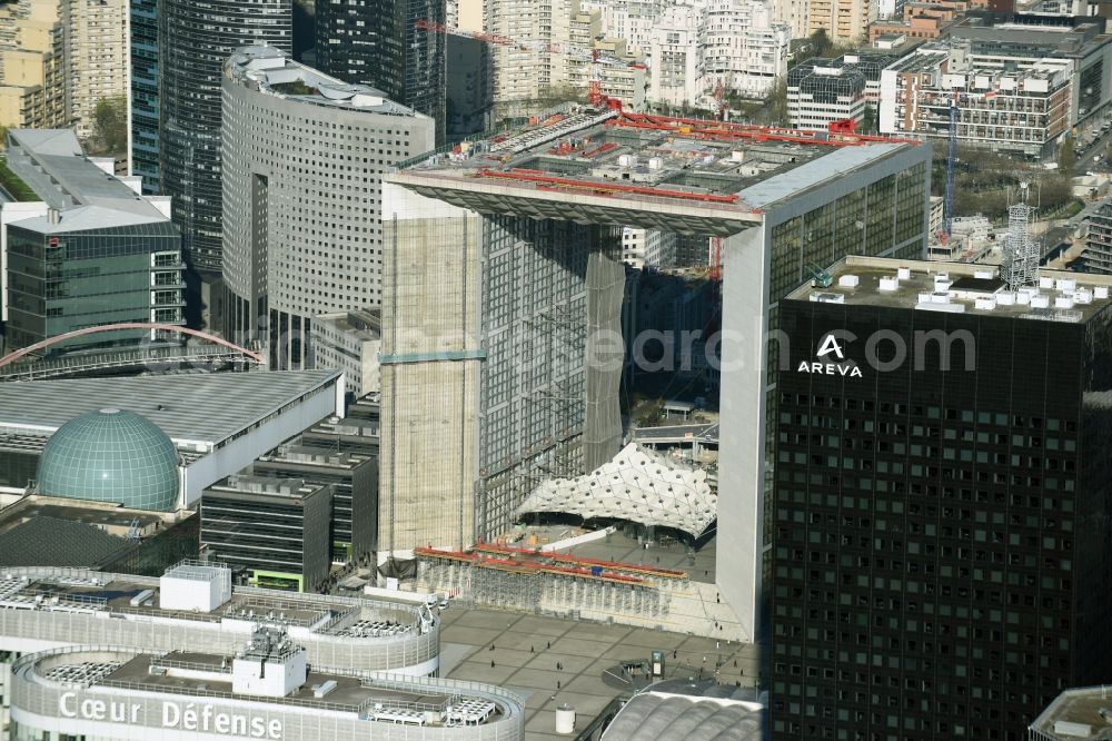 Paris from the bird's eye view: Office building Grande Arche and skyscraper Tour Areva in the business quarter of highrise buildings La Défense in Paris in Ile-de-France, France. It is home to the ministry of commerce and traffic, to offices and the human rights association