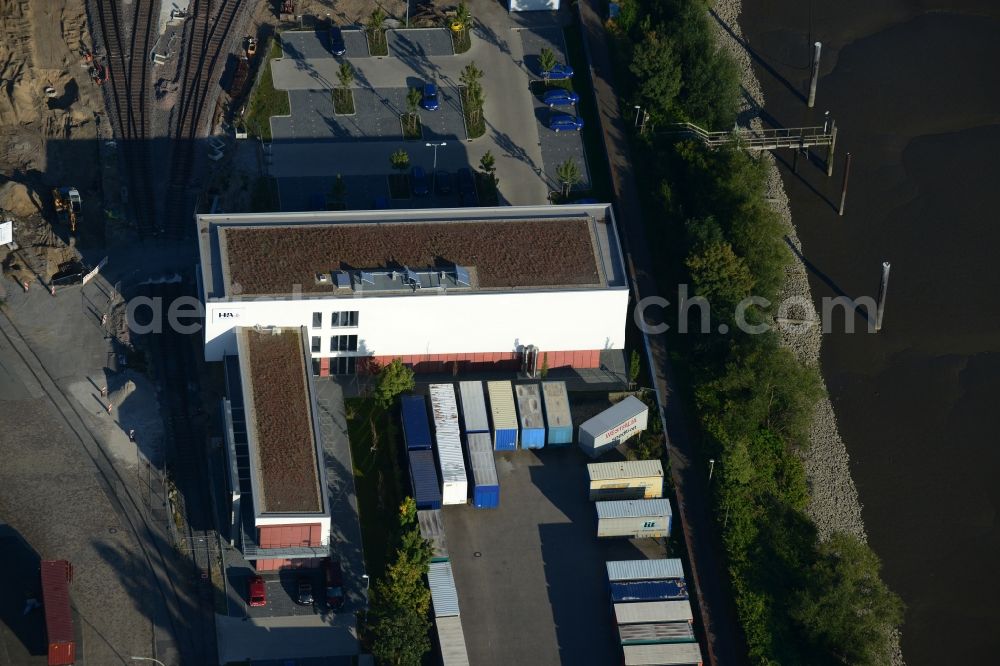 Hamburg from above - Office building of the port railway on the Spree harbour Island in Hamburg-Mitte / Kleiner Grasbrook. A project of the Hamburg Port Authority HPA