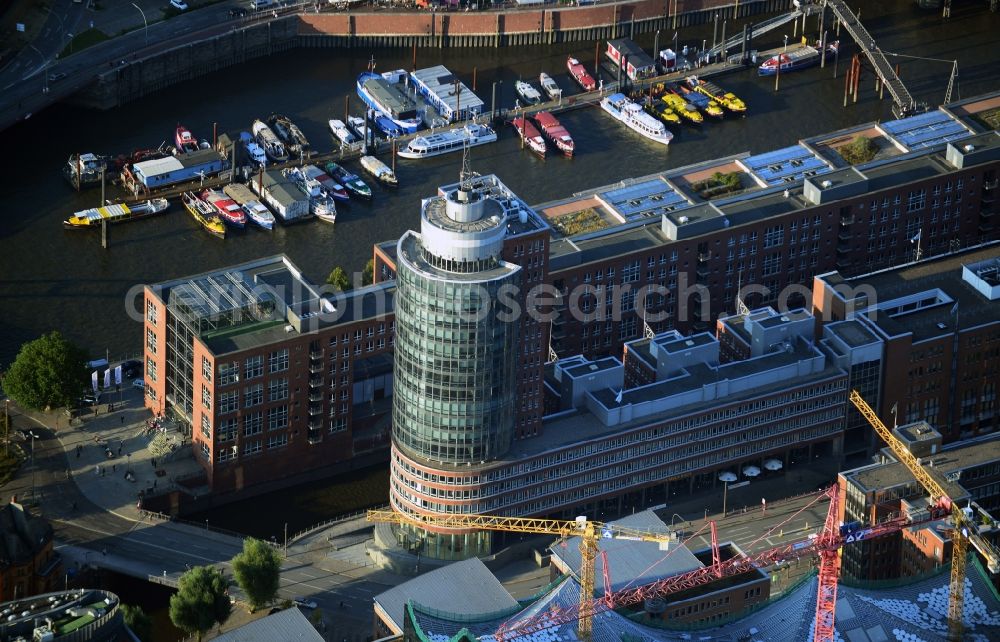 Hamburg from the bird's eye view: The building office skyscraper Hanseatic Trade Center in the warehouse district of HafenCity in Hamburg