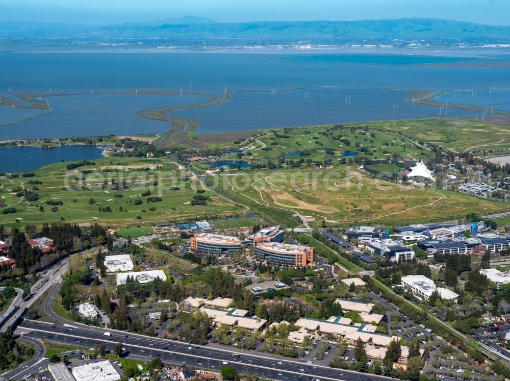 Mountain View from above - Office building complex Googleplex with the company headquarters of Google Inc. in front of Shoreline Park on the Pacific Coast in Mountain View in Silicon Valley in California in the USA