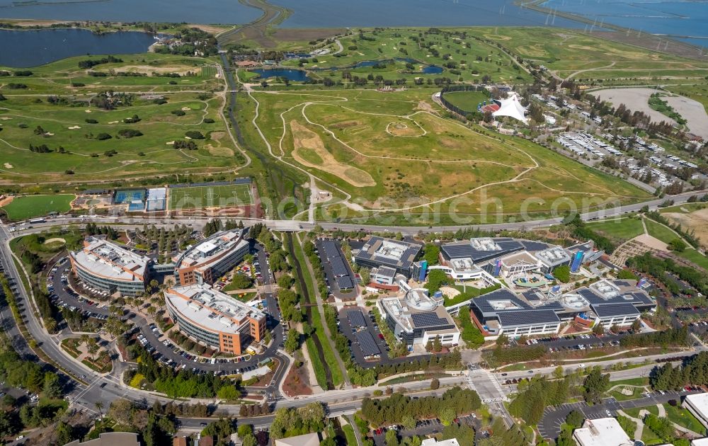 Aerial image Mountain View - Office building complex Googleplex with the company headquarters of Google Inc. in front of Shoreline Park on the Pacific Coast in Mountain View in Silicon Valley in California in the USA