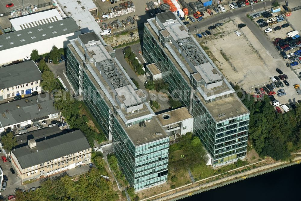 Berlin from above - Office building on the Northern riverbank of Teltowkanal in the Tempelhof part of Berlin. The complex is home to several IT-businesses and has a distinct glass front