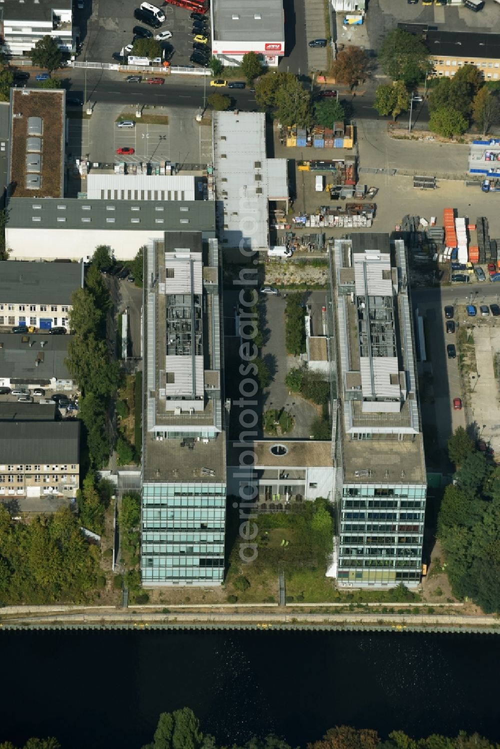 Aerial image Berlin - Office building on the Northern riverbank of Teltowkanal in the Tempelhof part of Berlin. The complex is home to several IT-businesses and has a distinct glass front