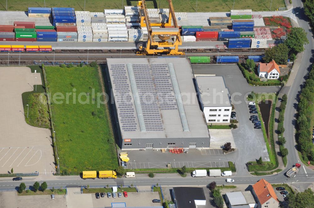 Aerial photograph Bönen - Bürogebäude mit Logistikhalle an der Weetfelder Straße 41 in Bönen in Nordrhein-Westfalen / North Rhine-Westphalia. Ein Projekt der Unternehmensgruppe Markus Gerold. Mieter ist die TNT Innight GmbH & Co. KG.