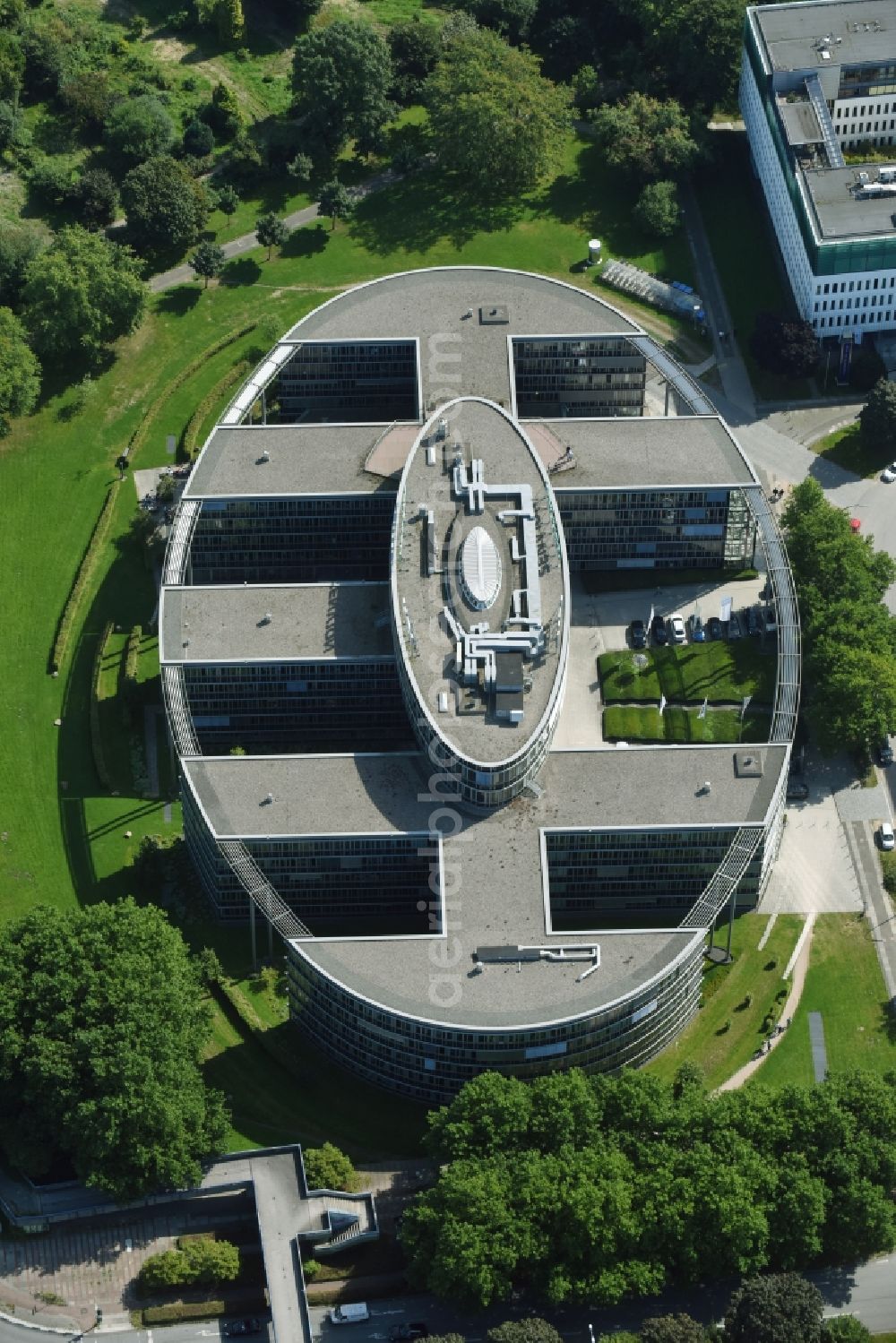 Hamburg from above - Office building Oval Office in the City Nord business quarter on Ueberseering in Hamburg. The oval building is home to Sprinkenhof GmbH, Senvion and HDI-Gerling Industrie Versicherung AG