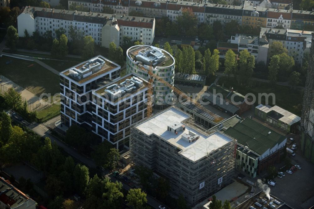 Aerial image Berlin - Office and research buildings on EUREF-Campus in the Schoeneberg part of Berlin in Germany. The architectural distinct buildings on the traditional and historic industrial site at the Gasometer of Berlin are used as event locations, offices and residential buildings