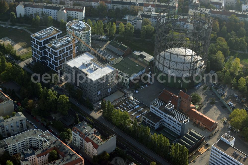 Aerial photograph Berlin - Office and research buildings on EUREF-Campus in the Schoeneberg part of Berlin in Germany. The architectural distinct buildings on the traditional and historic industrial site at the Gasometer of Berlin are used as event locations, offices and residential buildings