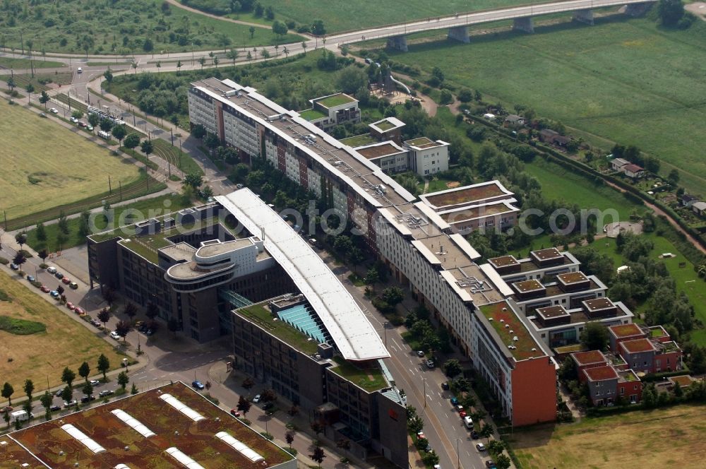 Aerial photograph Dresden - Office building of the company SV Sachsen and block of flats at the street An der Flutrinnes in Dresden-Mickten in Saxony