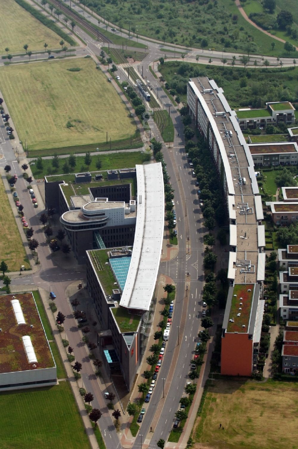 Dresden from above - Office building of the company SV Sachsen and block of flats at the street An der Flutrinnes in Dresden-Mickten in Saxony