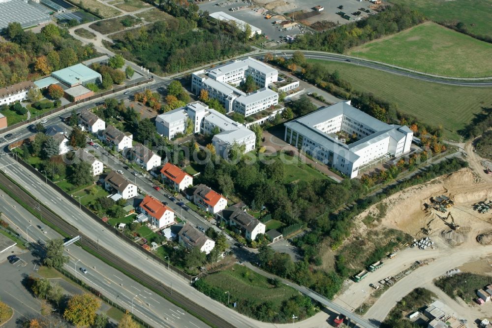 Aerial image Mainz - Office and residential buildings in the Hechtsheim part in the city of Mainz in Rhineland-Palatinate. The district is located in the agriculturally informed South of the state capital and consists largely of residential estates and single family homes. Hechtsheim is the largest district of Mainz. The office complexes include the finance office Mainz South and the State Office for Geology and Mining of Rhineland-Palatinate