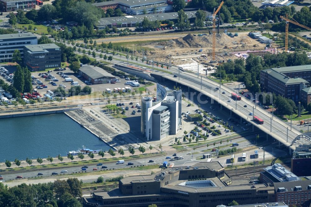 Kiel from the bird's eye view: Office building complex Hoern Campus in Kiel in the state of Schleswig-Holstein. The bent shape was designed by Schmidt+Bremer architects. The building is located on the Southern end of Kiel harbour