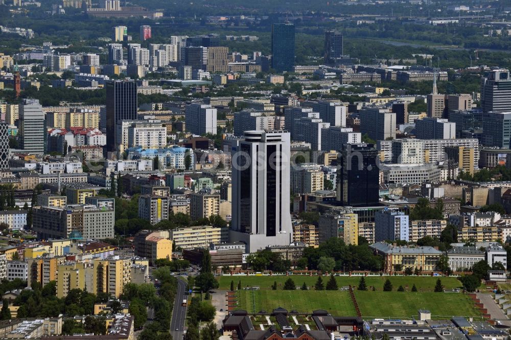 Warschau from above - Office tower Millennium Plaza in downtown Warsaw in Poland. In its lower floors there is a shopping mall. The high rise building was completed in 1999 and is located in the city center. It is located a little further away from the other downtown office towers and towers above the surrounding post-war buildings. Main tenant and name giving company was the Millenium bank. One of its main tenants today is the IT company Dell, whose logo is on its upper floors, very well visible from afar. It is 112m high, including antenna it stands at 124m