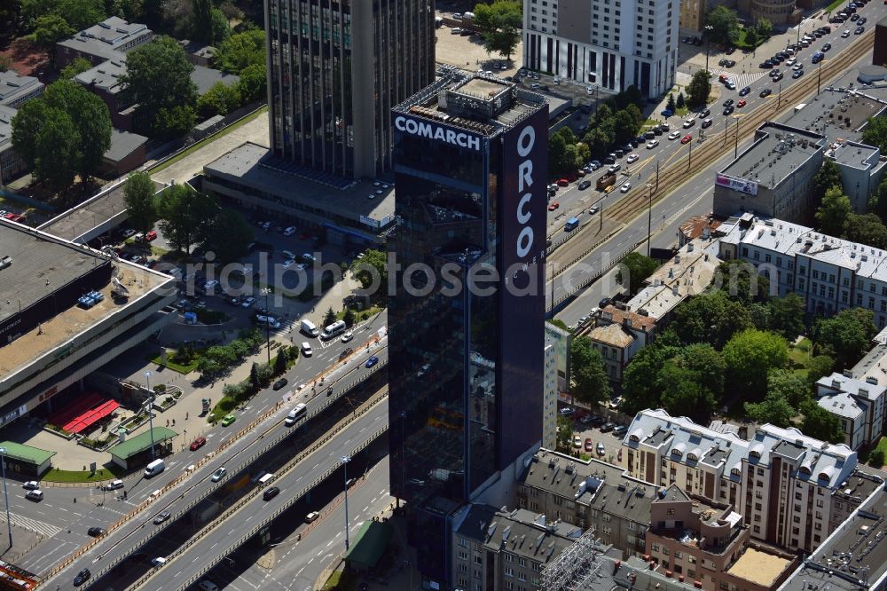 Warschau from the bird's eye view: Office tower ORCO Tower in the Ochota district in downtown Warsaw in Poland. Owner of the high rise building with its distinct dark glas facade is the ORCO Property Group. It was completed in 1996, built in the style of post-modern US-skyscrapers. It is 115m high with 27 floors. It was refurbished in 2008 and the ORCO writing was put on its side. Main tenant is the IT company Comarch, whose logo was also put on the roof. The office tower Oxford Tower is visible in the background