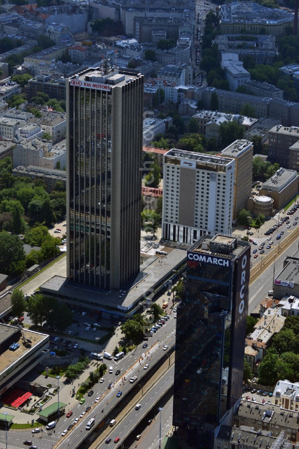 Warschau from above - Office tower ORCO Tower in the Ochota district in downtown Warsaw in Poland. Owner of the high rise building with its distinct dark glas facade is the ORCO Property Group. It was completed in 1996, built in the style of post-modern US-skyscrapers. It is 115m high with 27 floors. It was refurbished in 2008 and the ORCO writing was put on its side. Main tenant is the IT company Comarch, whose logo was also put on the roof. The office tower Oxford Tower is visible in the background