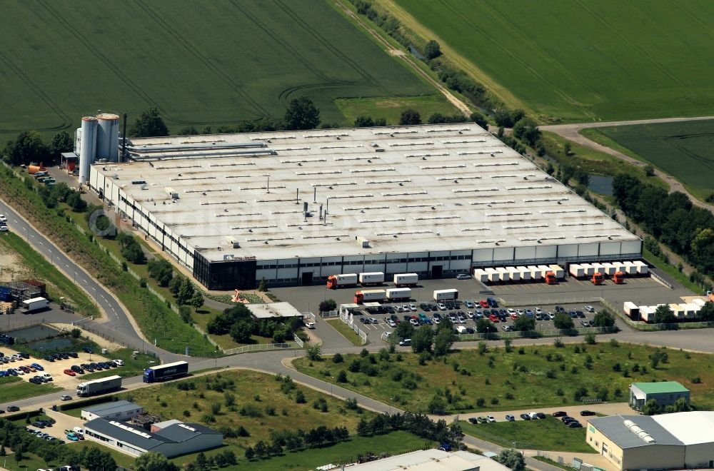 Aerial photograph Weißensee - In the Dr.-Karl-Heinz-Muhr Street from Weissensee in Thuringia is one of the most modern office furniture works of the continent. The Koenig und Neurath company built here 20 years ago, this modern production facility in the furniture for workstations and customized closet systems are manufactured