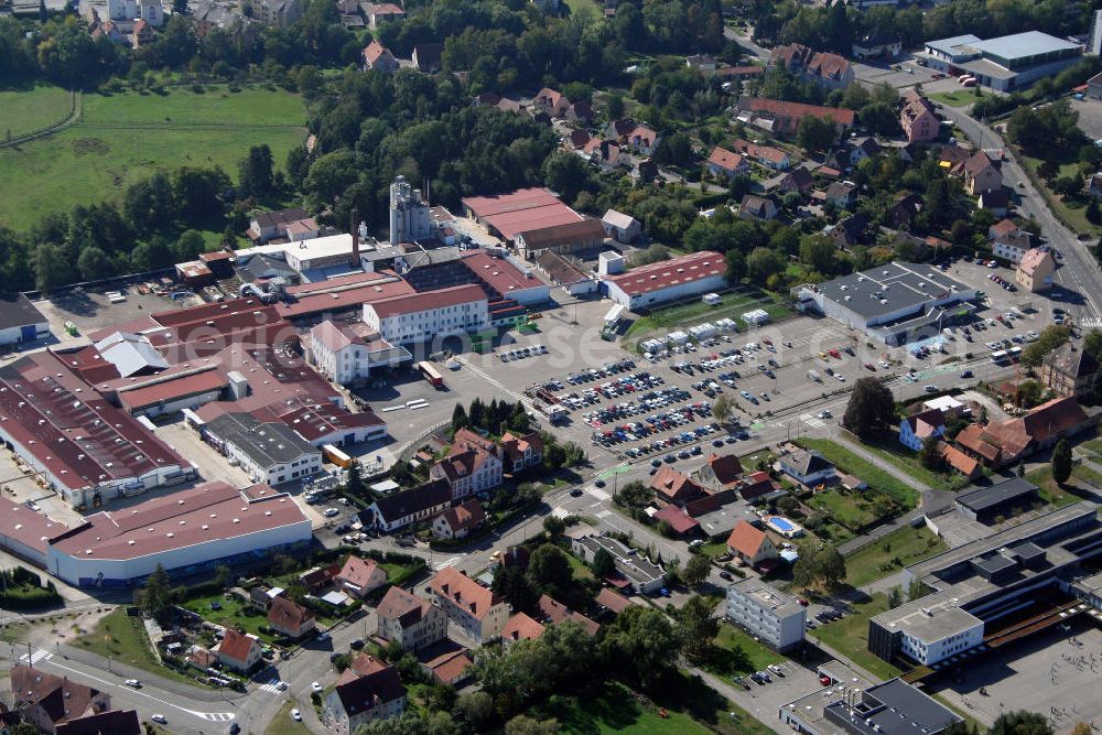 Weissenburg im Elsass / Wissembourg from above - Die Bürstner GmbH Wissembourg in Frankreich ist ein Hersteller von Reisemobilen, Caravans und Mobilhomes und ist Teil der Hymer-Gruppe. Anfang des 20. Jahrhunderts begann Jakob Bürstner mit dem Bau der Wohnwagen. The Bürstner GmbH Wissembourg in France is a producer of caravans and is a part of the Hymer-Group. At the beginning of the 20. century, Jakob Bürstner began to produce caravans.