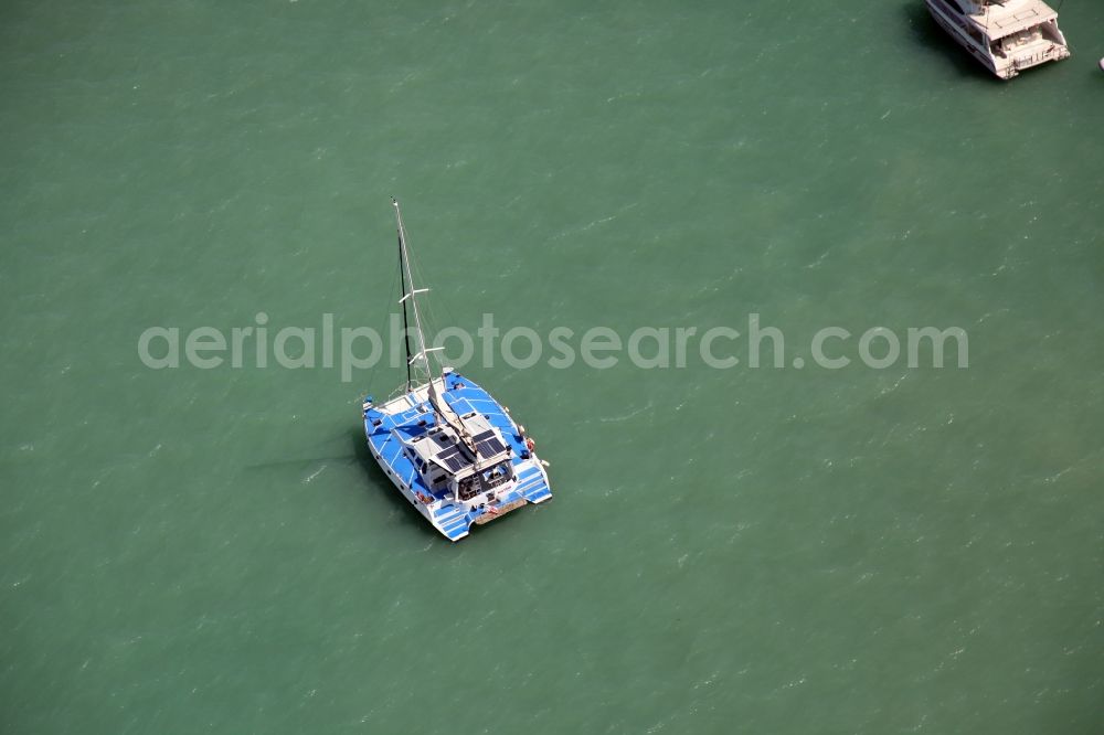 Aerial image Chalong - Bay with boats and yachts in front of city Chalong in Phuket in Thailand