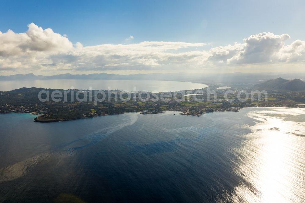 Alcudia from above - Water surface at the bay along the sea coast of Balearic Sea in Alcudia in Balearic islands, Spain