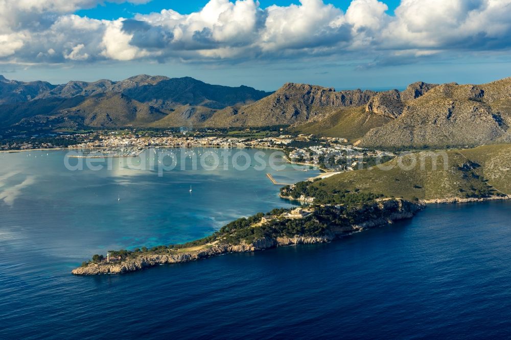 Pollenca from the bird's eye view: Water surface at the bay along the sea coast of Balearic Sea in Pollenca in Balearische Insel Mallorca, Spain